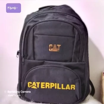 کوله پشتی جادار وجنس ودوخت عالی برند CAT دارای ورودی کابل  آیو ایکس جنس خارجی 