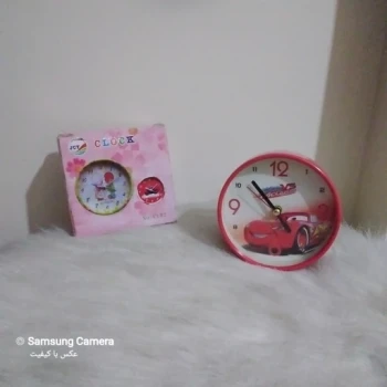 ساعت رومیزی شماطه دار طرح مک کوئین 