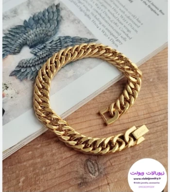 دستبند مردانه برند کارتیر دارای قفل ساعتی طلایی و نقره ای سایز بزرگ کد 6038