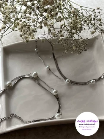 نیم‌ست زنانه ماری مرواریدی استیل در دورنگ نقره ای و طلایی کد 3563