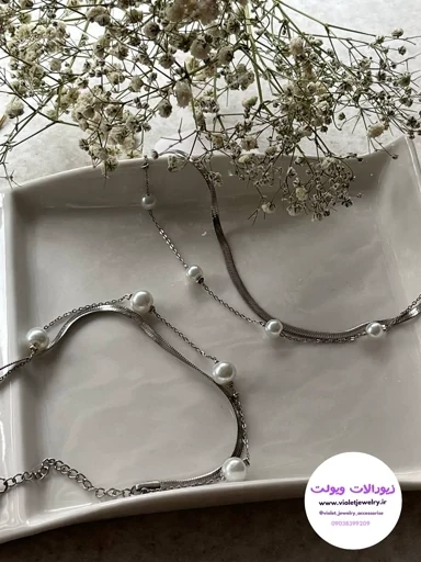 نیم‌ست زنانه ماری مرواریدی استیل در دورنگ نقره ای و طلایی کد 3563