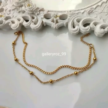 دستبند  پابند زنانه ظریف ترکیب کارتیر و زنجیر توپی جنس استیل (ویولت گالری) کد 7082